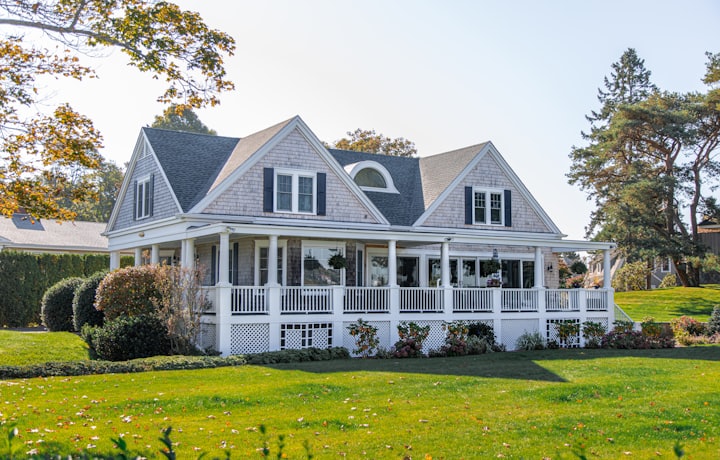 Classic white home with a wide green front yard