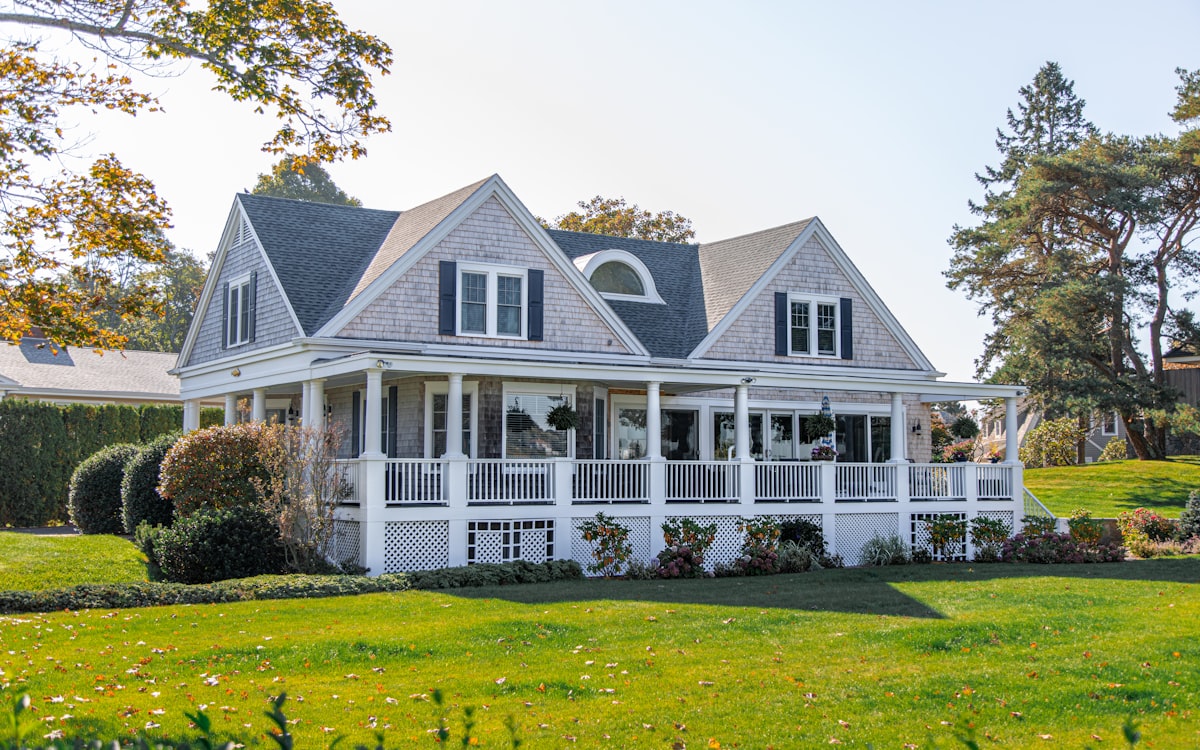 Classic white home with a wide green front yard